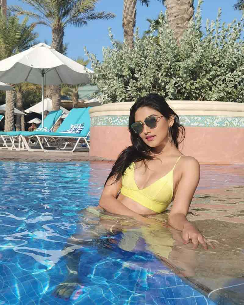 Donal Bisht in yellow bikini in swimming pool pix