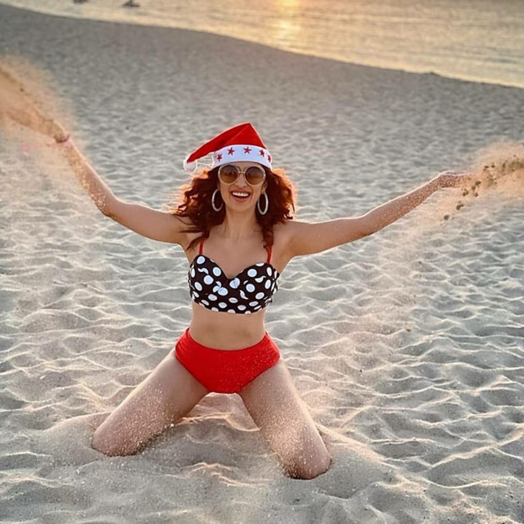 Hot and Sexy Raai Laxmi in Bikini having Fun on Beach