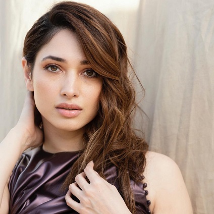 Tamannaah Bhatia in a photoshoot playing with her Biographia