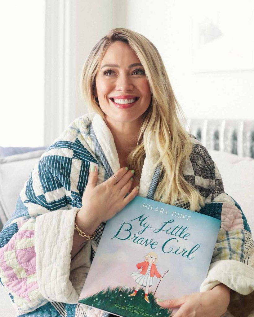Hilary Duff with her book my little brave girl HD Picture