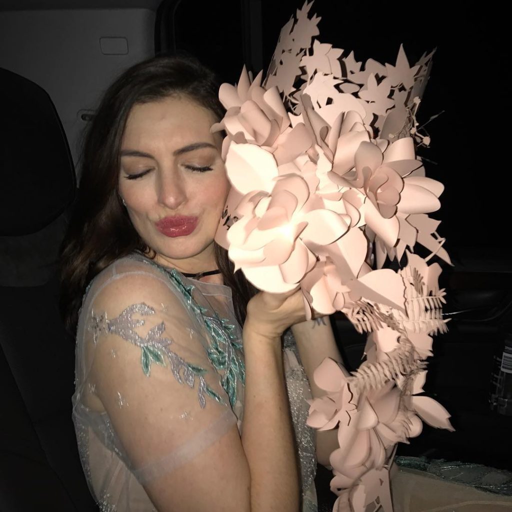 Sexy Anne Hathaway with flowers HD PIcture