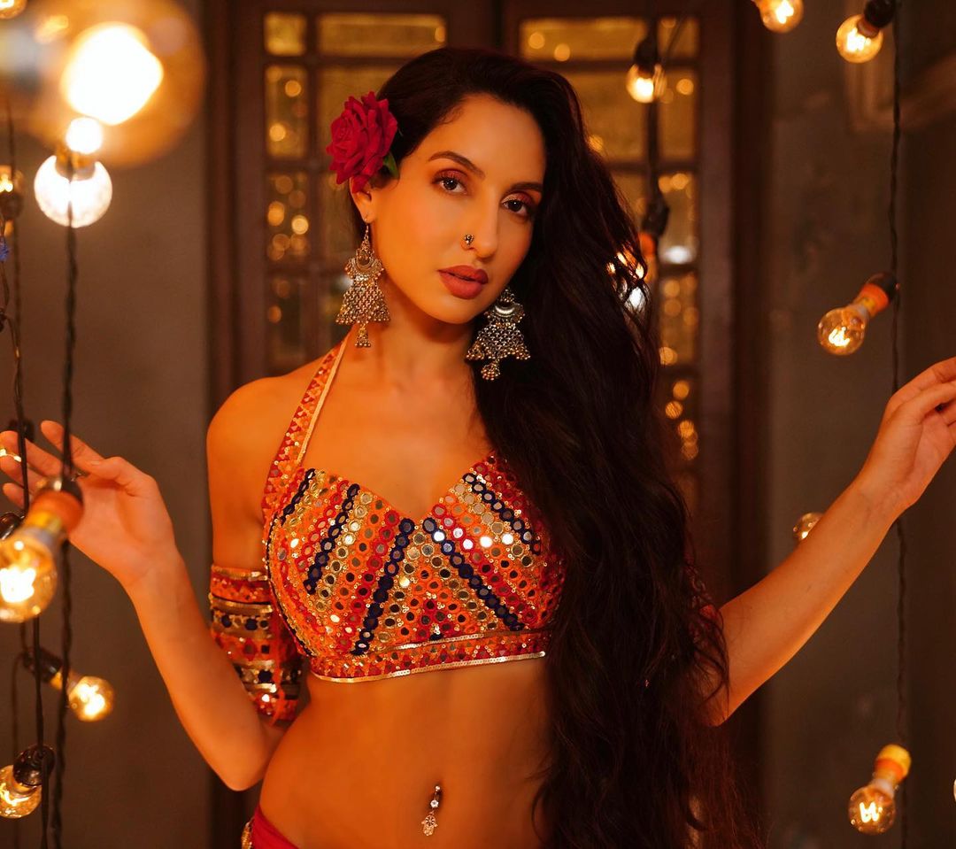 Blazing Hot Pic of Nora Fatehi in Colourful Bralette and Lehenga