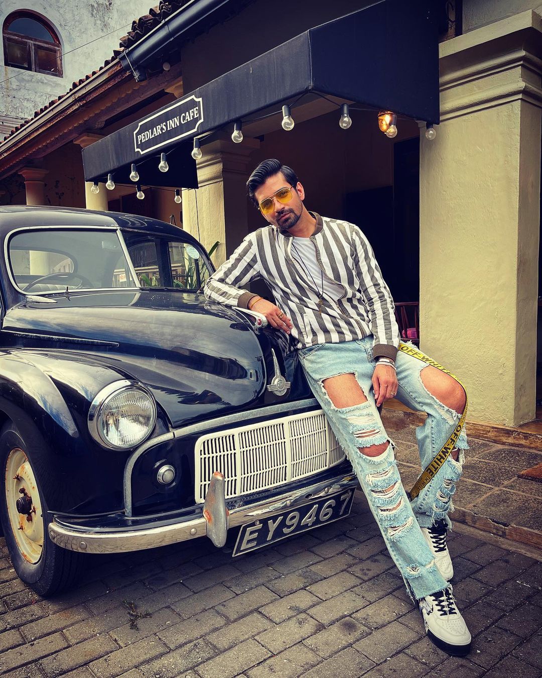 Handsome and Dashing Photo of Vishal Singh in Stripe Jacket and Torn Jeans