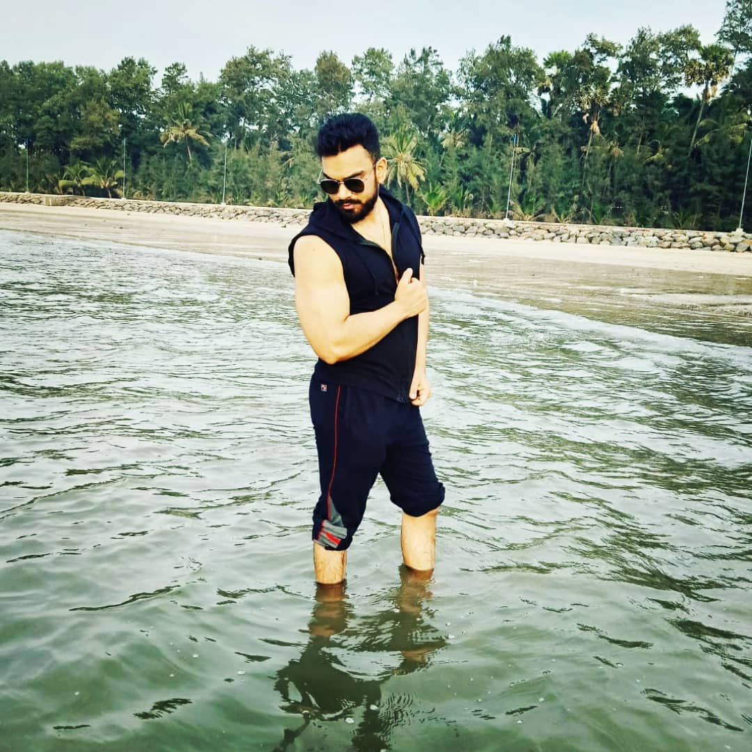 The Indo Traveller in Black Sleeveless Jacket and Navy Blue Lower in Mumbai